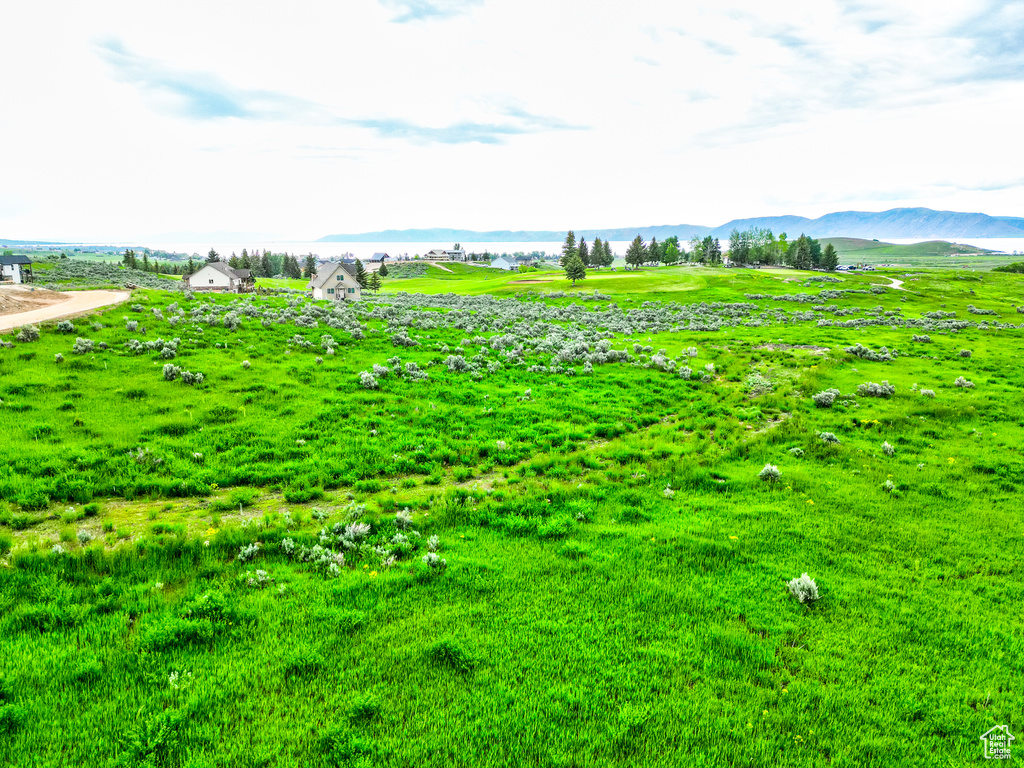 View of yard featuring a mountain view and a rural view