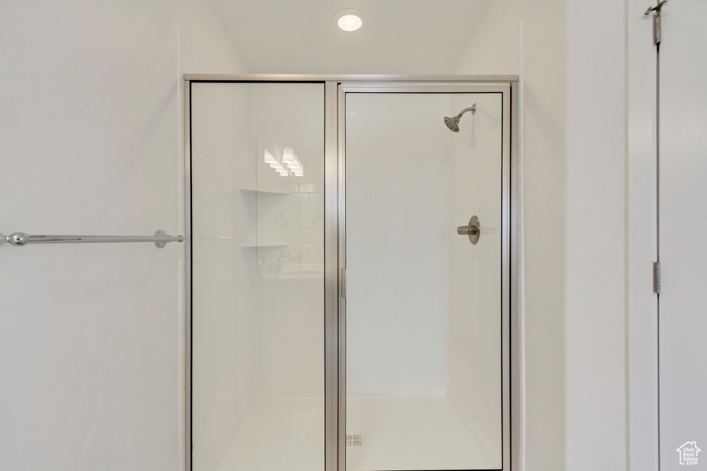 Full bathroom featuring a stall shower