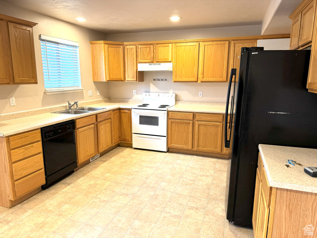 Kitchen featuring sink and black appliances