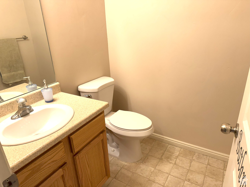 Bathroom with vanity and toilet