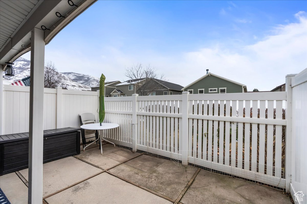 View of patio / terrace featuring a mountain view