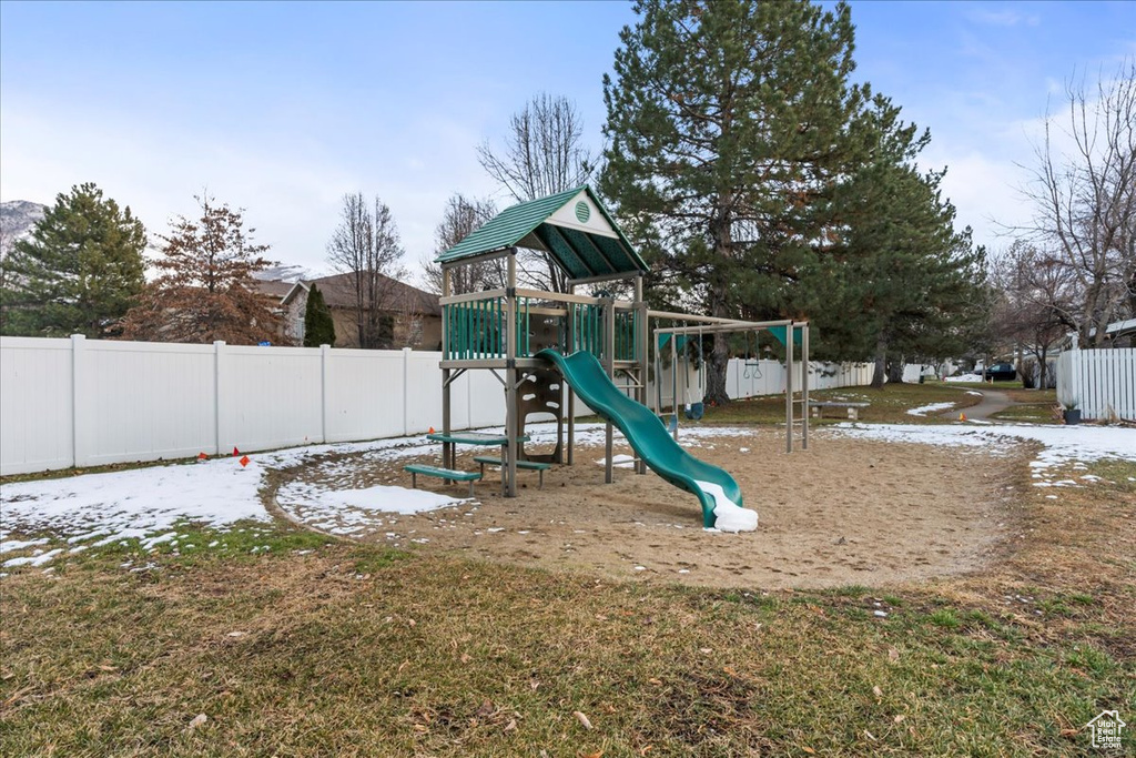 View of jungle gym featuring a yard