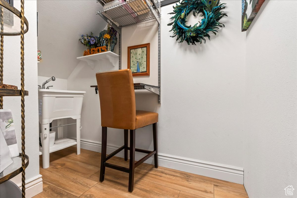 Office space with wood-type flooring