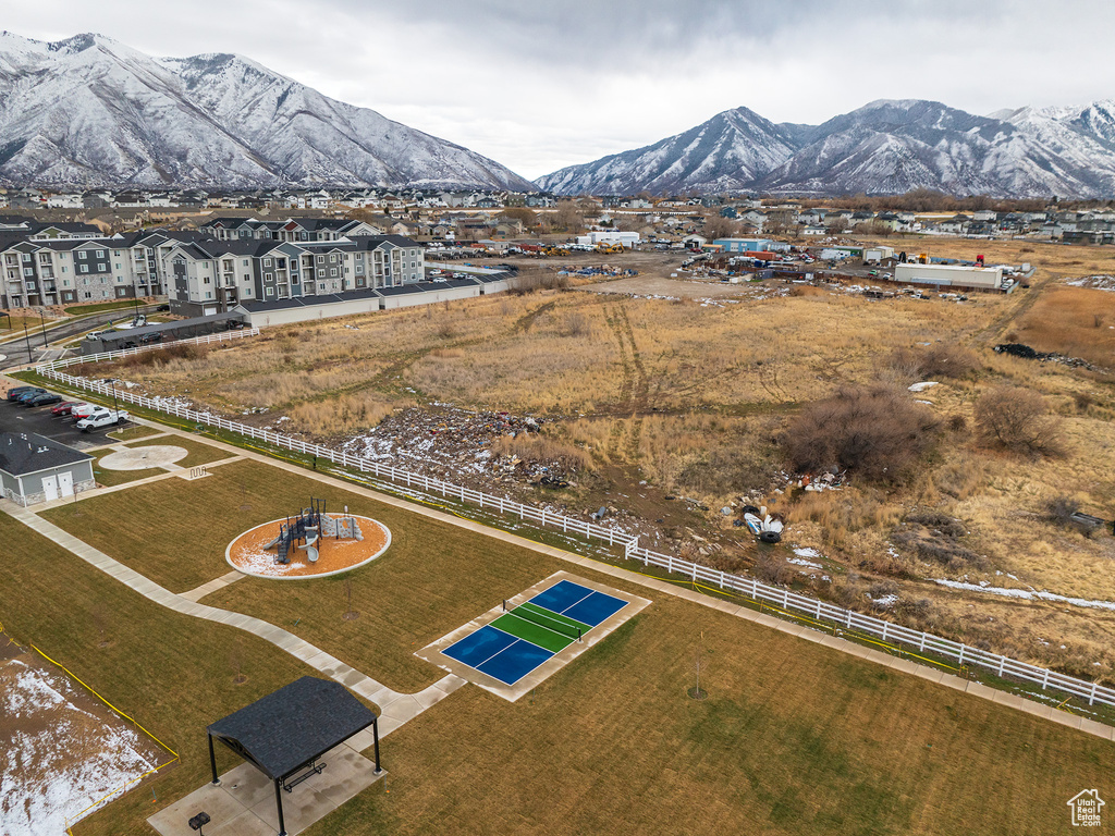 Birds eye view of property featuring a mountain view