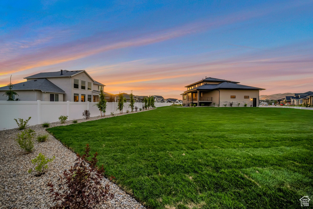 View of yard at dusk