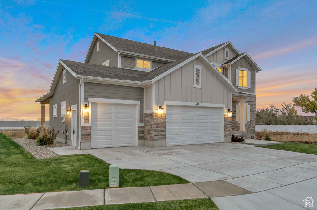 Craftsman-style home with a garage