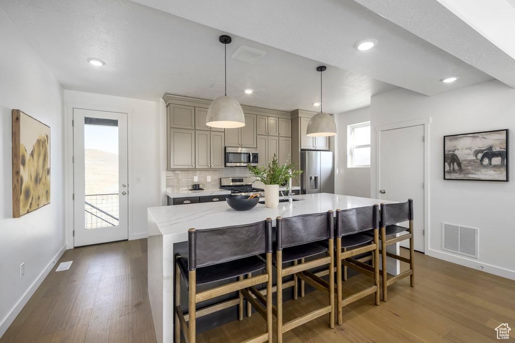 Dining room with visible vents, recessed lighting, baseboards, and dark wood-type flooring