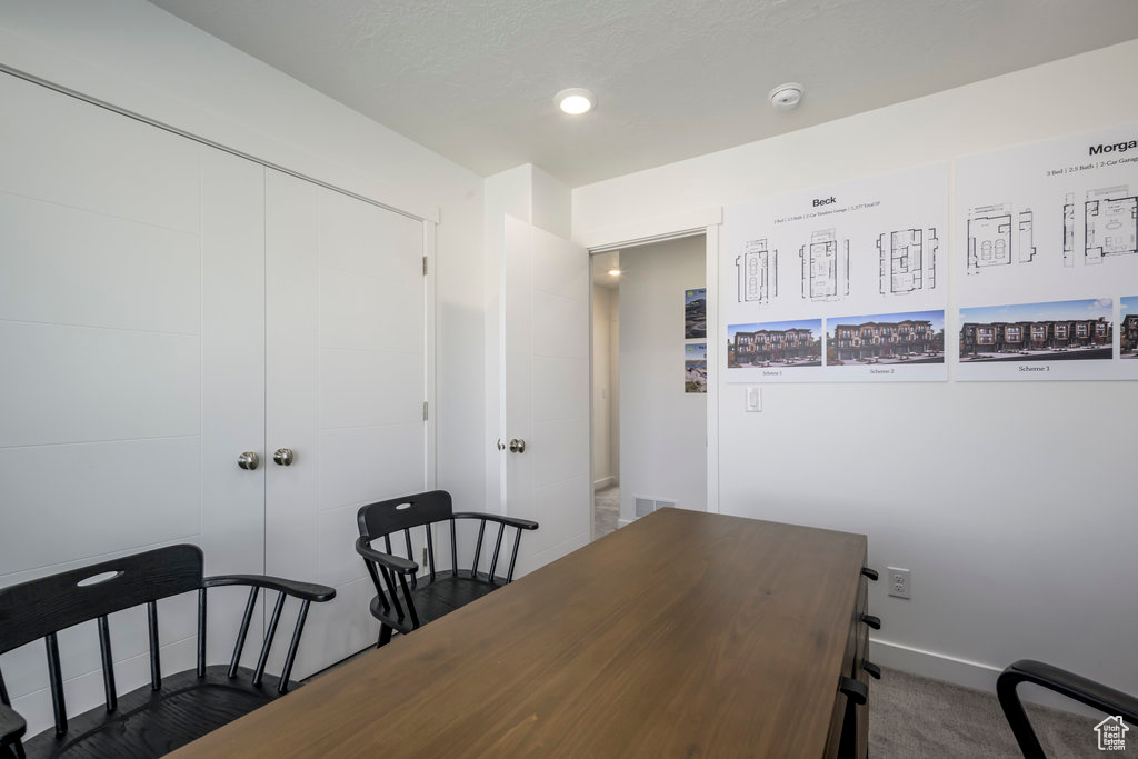 Home office with baseboards, recessed lighting, and dark carpet