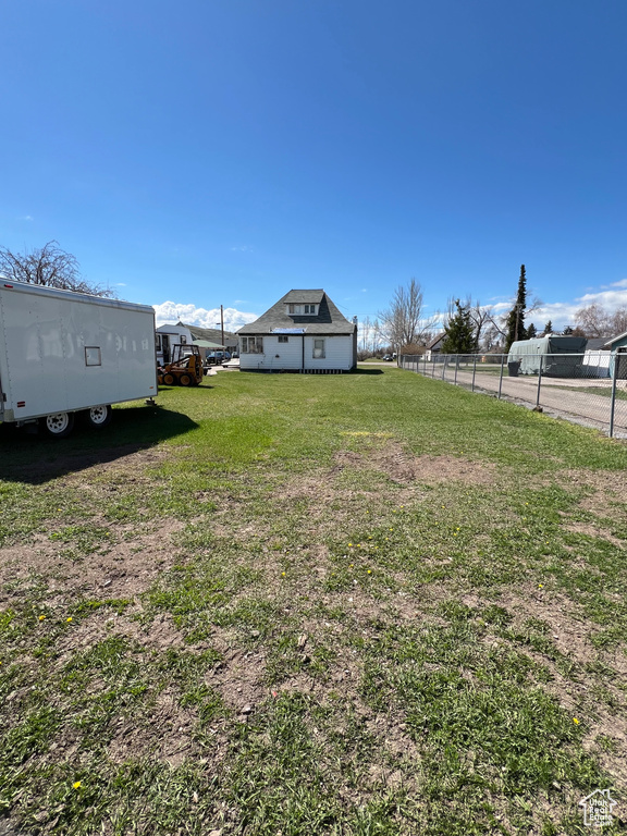 View of yard with fence