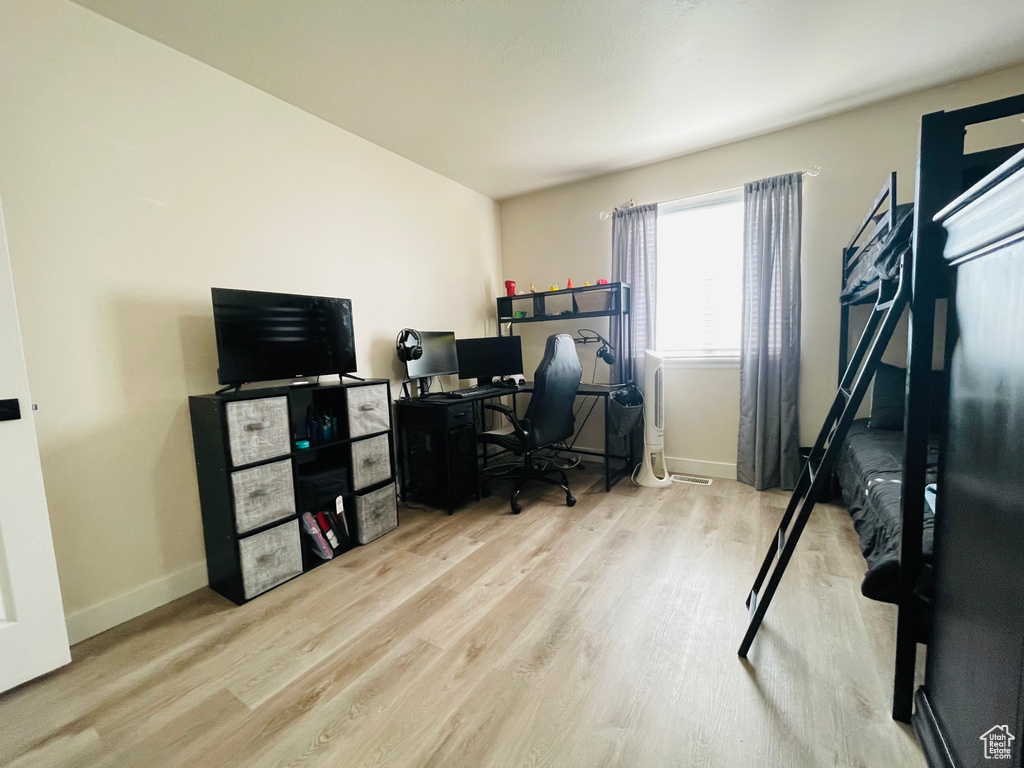 Office space featuring light hardwood / wood-style flooring