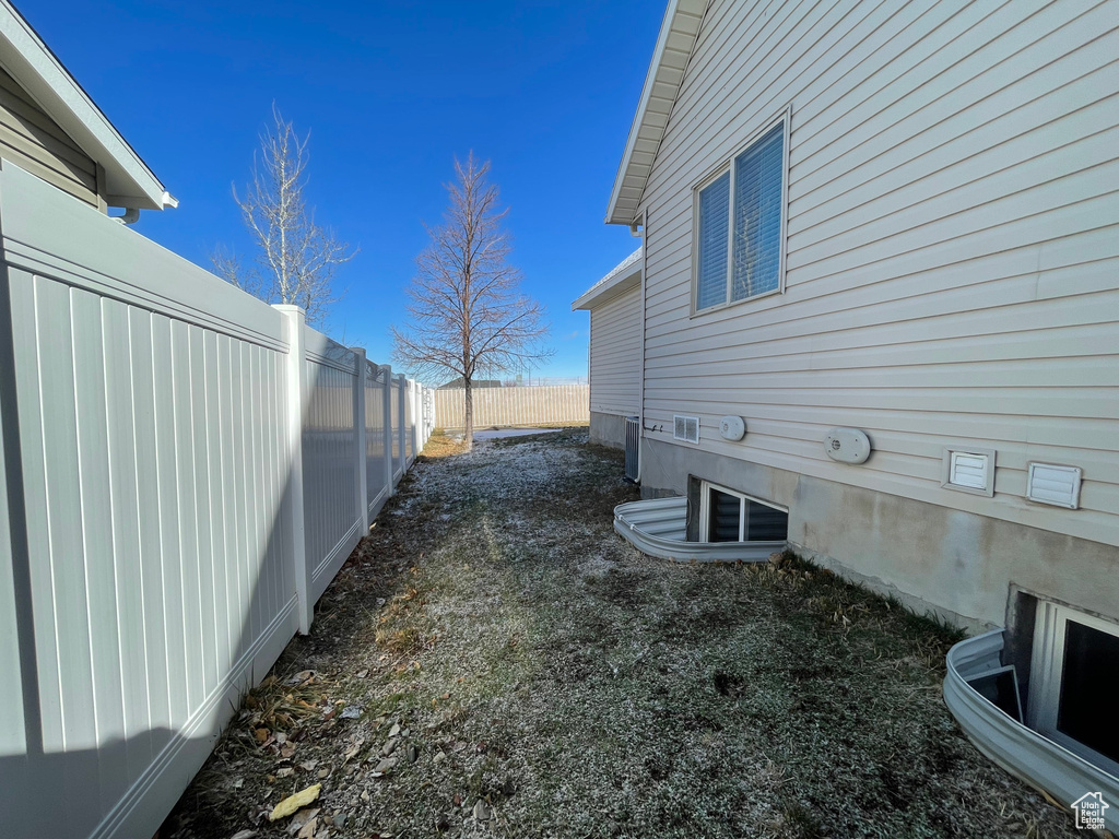 View of yard featuring central AC