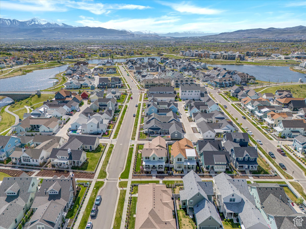 Aerial view featuring a water and mountain view