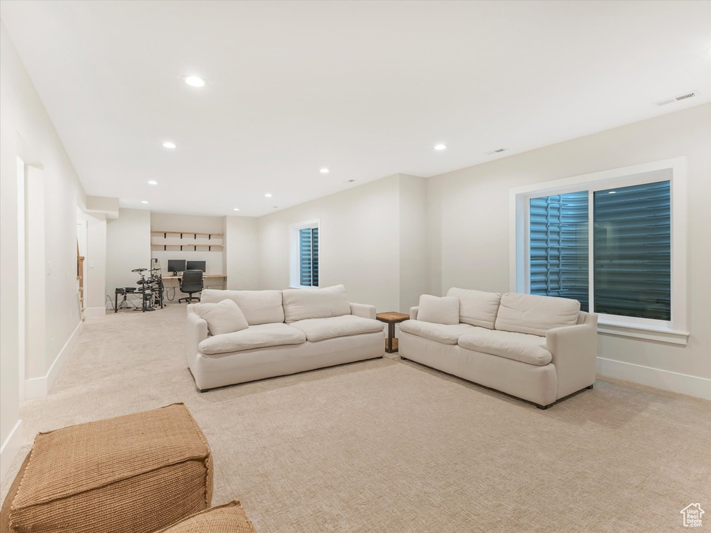 Living room with light colored carpet