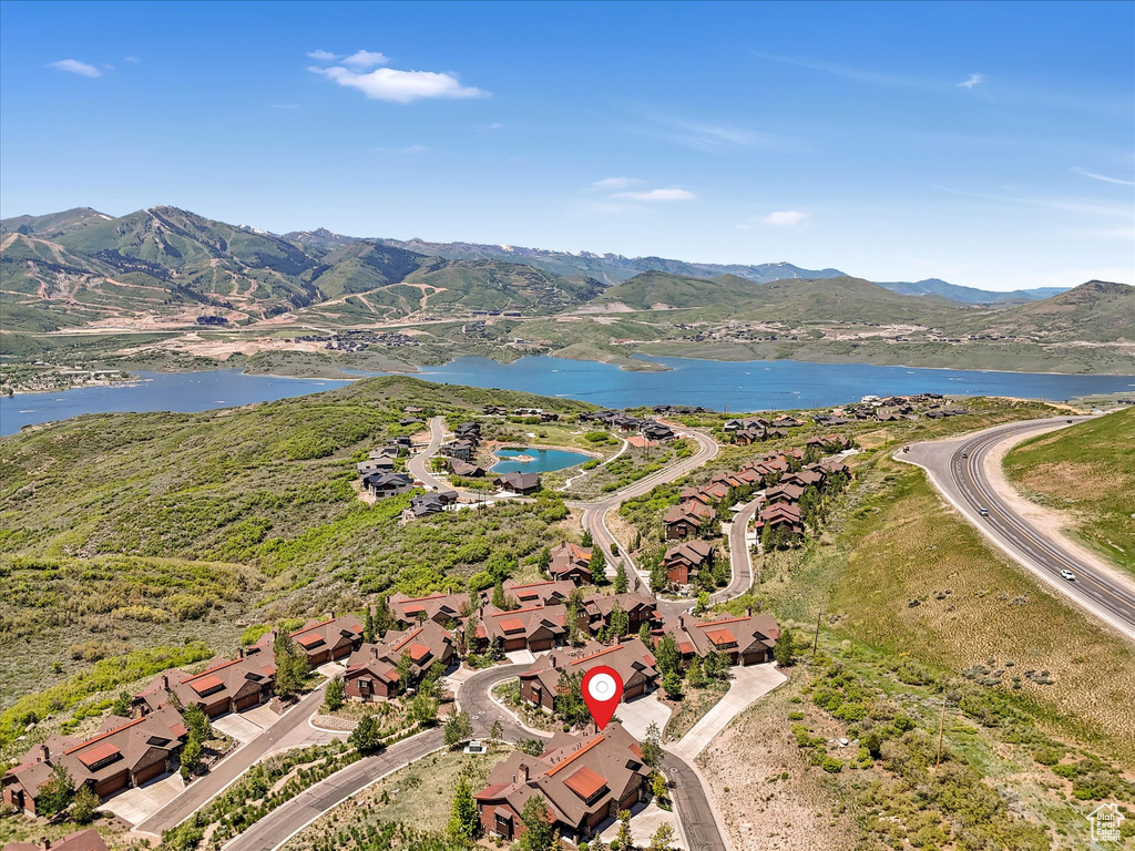 Aerial view of residential area with a water and mountain view