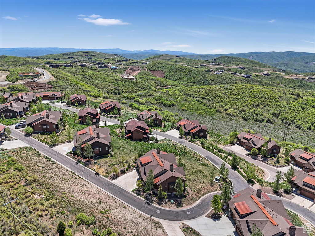 Aerial view of residential area with mountains