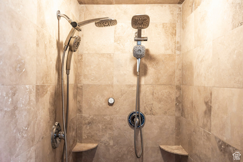 Bathroom view of a tile shower