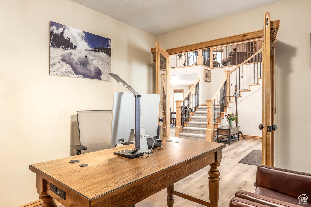 Office area with light wood finished floors