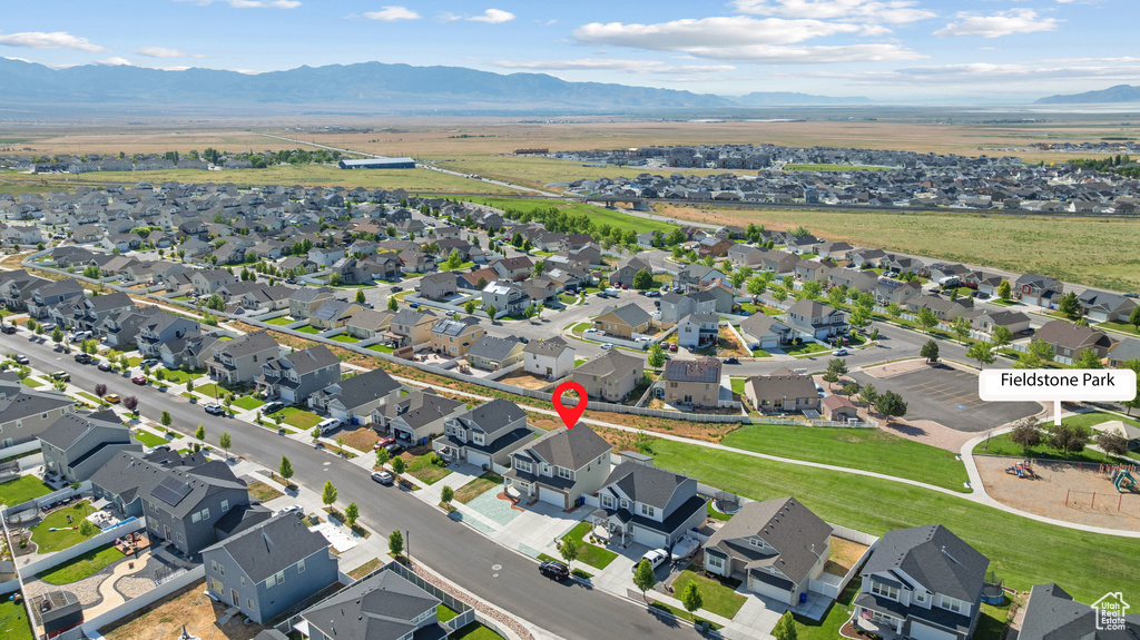 Aerial view of residential area with a mountain backdrop