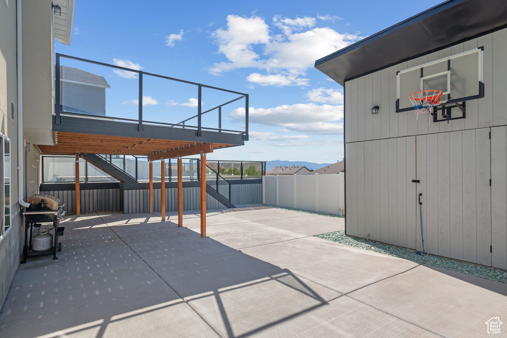 View of patio featuring stairs
