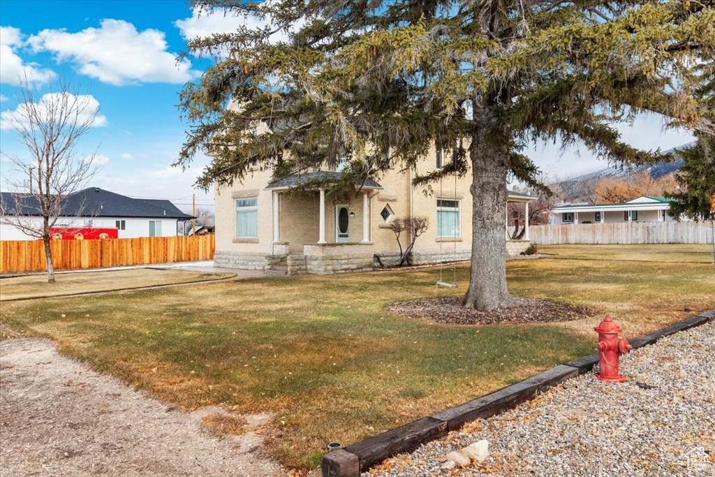 View of front of home with a front lawn