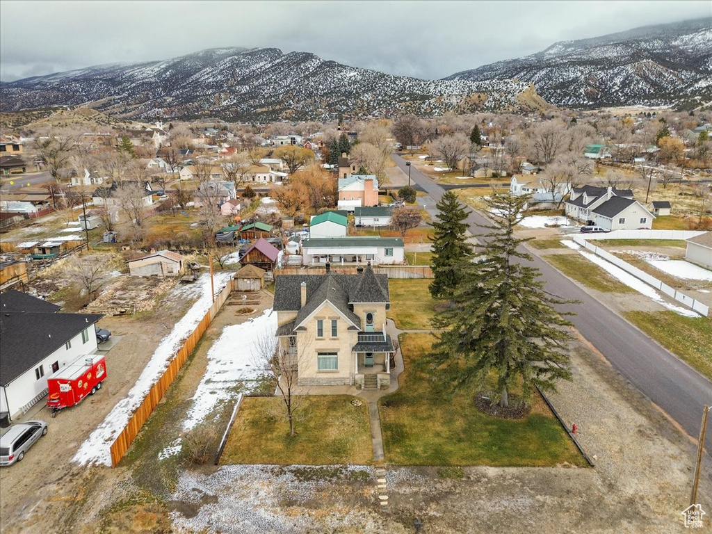 Birds eye view of property with a mountain view