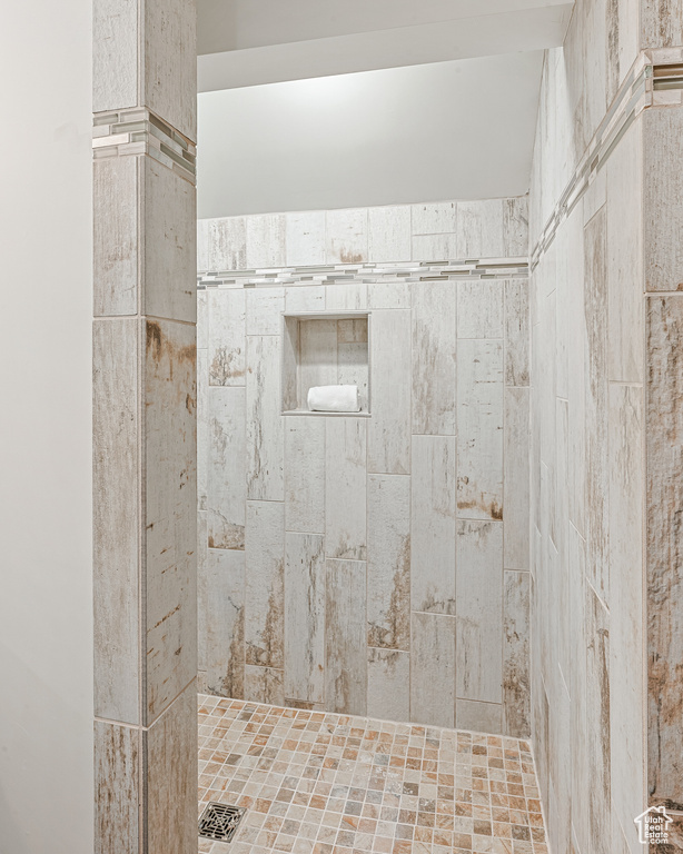 Bathroom with tiled shower