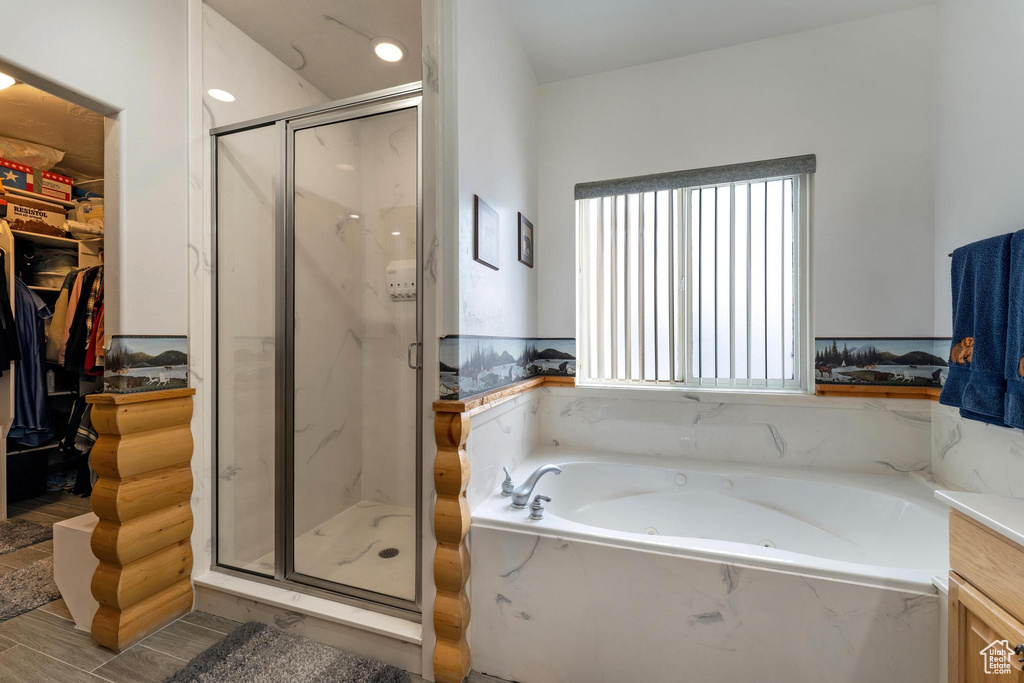 Bathroom with plus walk in shower