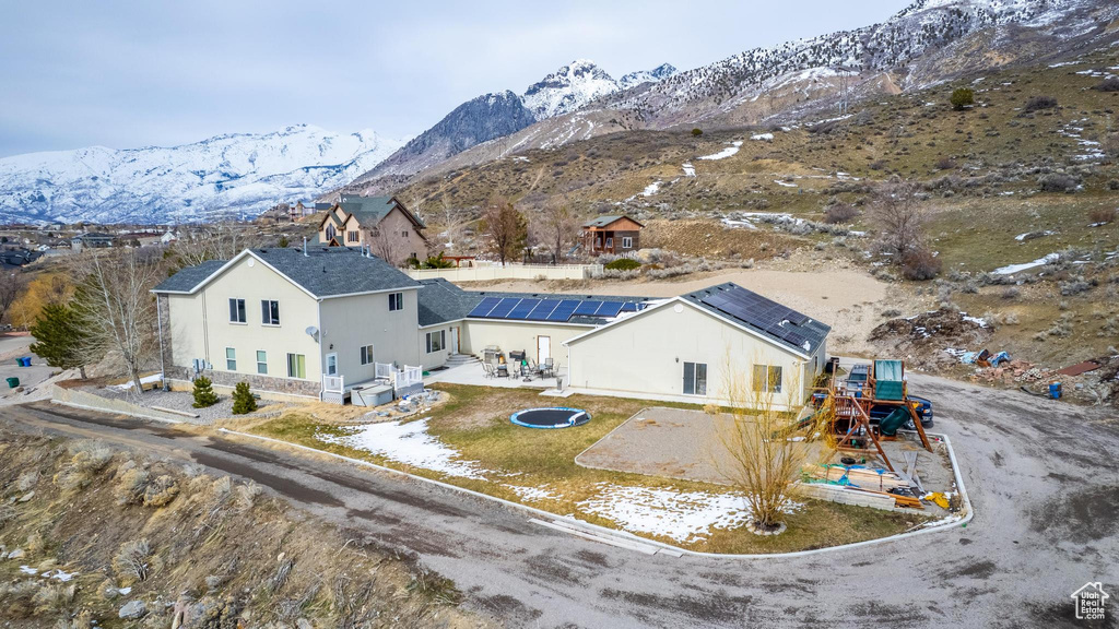 Birds eye view of property featuring a mountain view