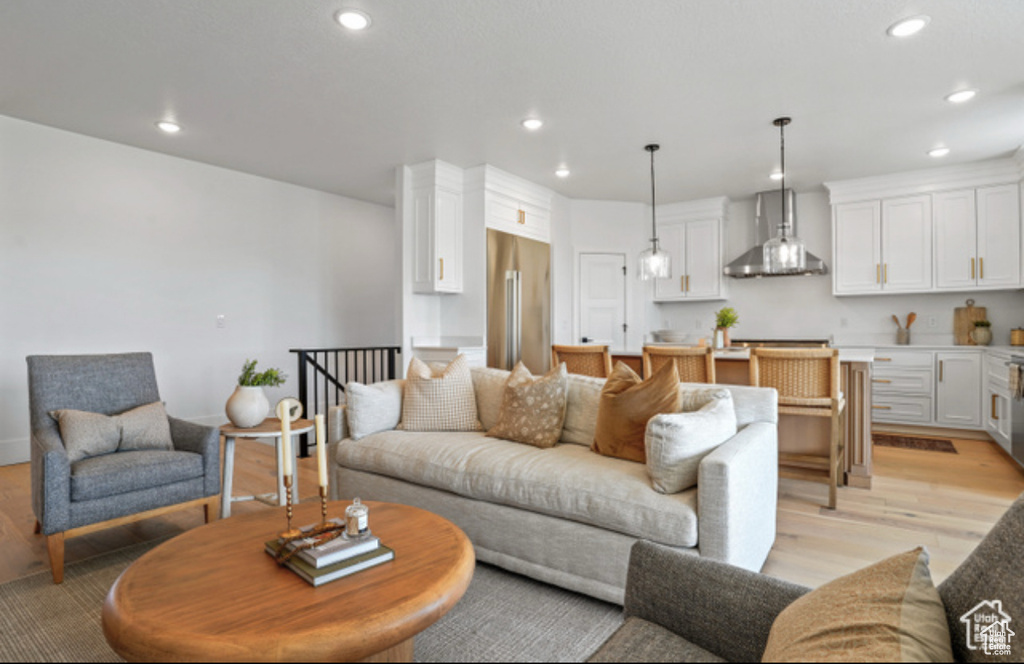 Living room with light wood-type flooring