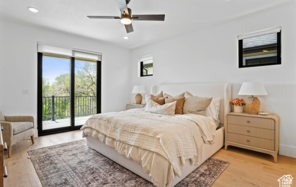 Bedroom featuring access to exterior, ceiling fan, and light wood-type flooring