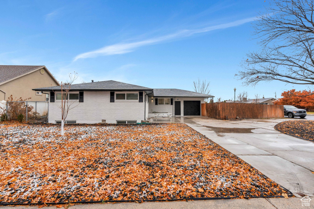 Single story home featuring a garage