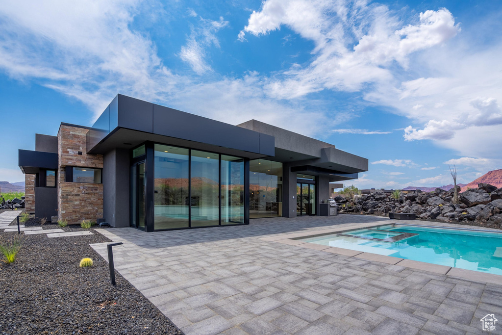 View of swimming pool with grilling area