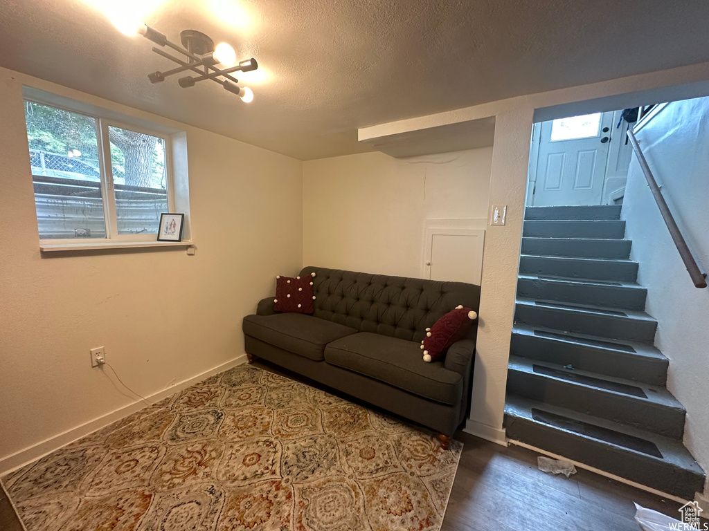 Living room featuring a textured ceiling