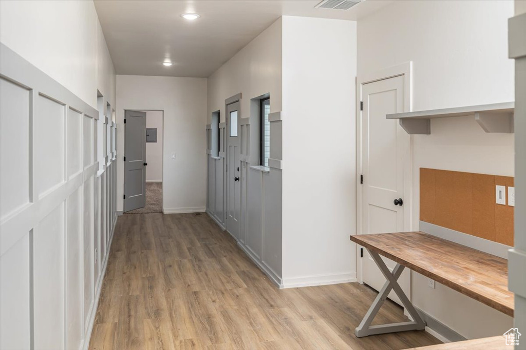 Hall featuring light hardwood / wood-style floors