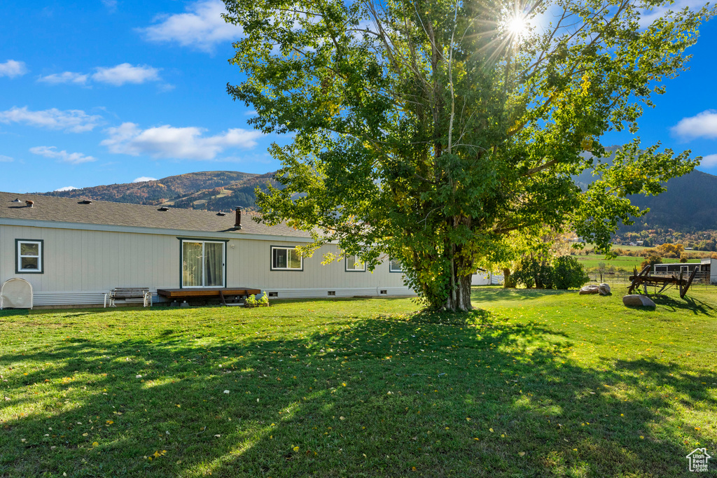 View of yard with a mountain view