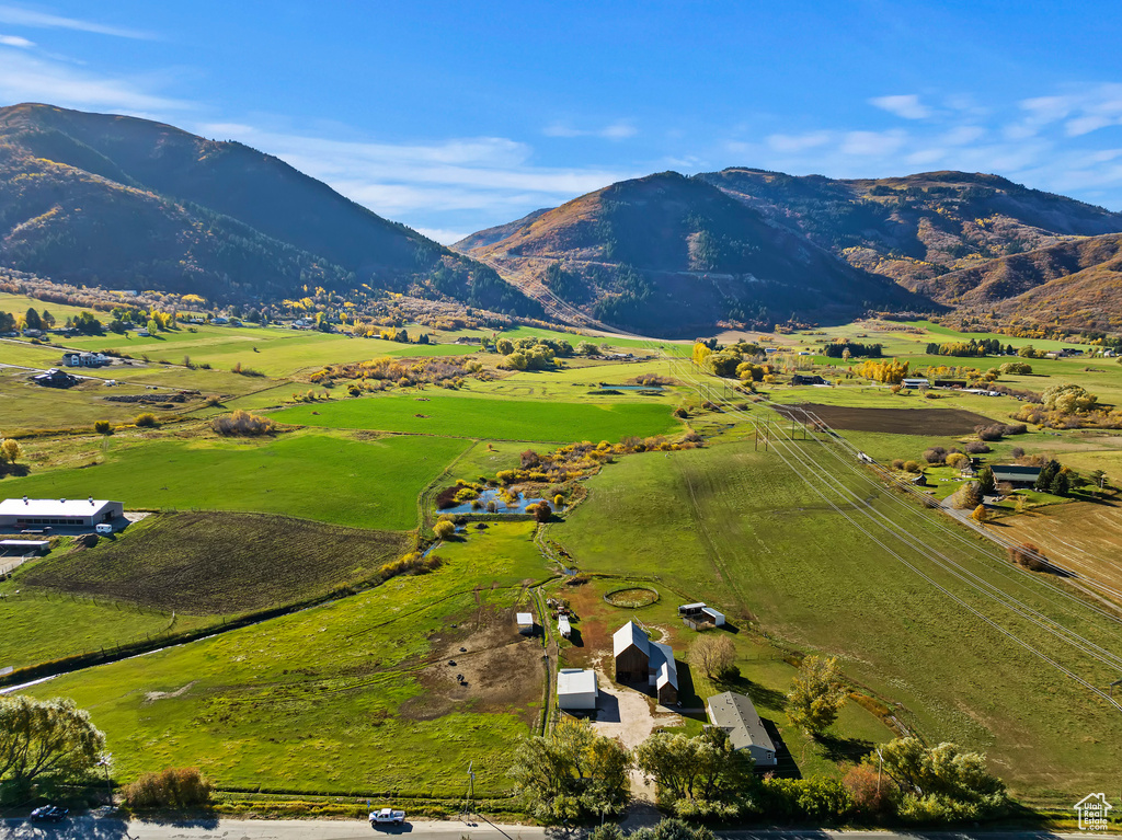 Drone / aerial view featuring a mountain view and a rural view