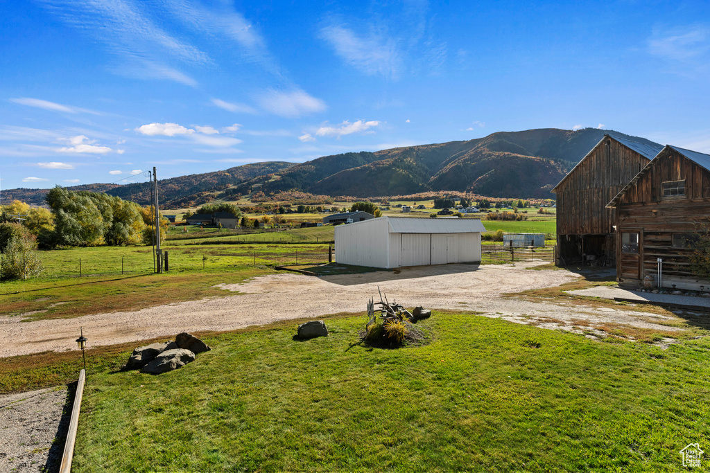 View of mountain feature with a rural view