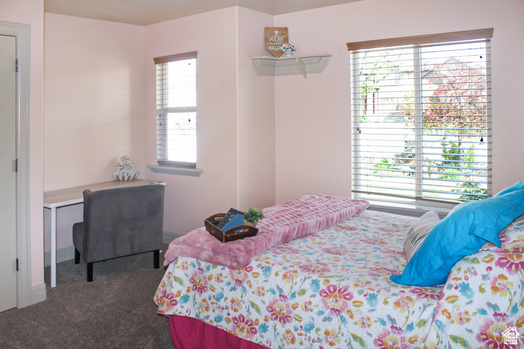 Bedroom featuring carpet flooring