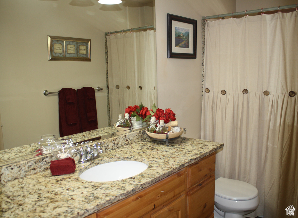 Bathroom with vanity and toilet