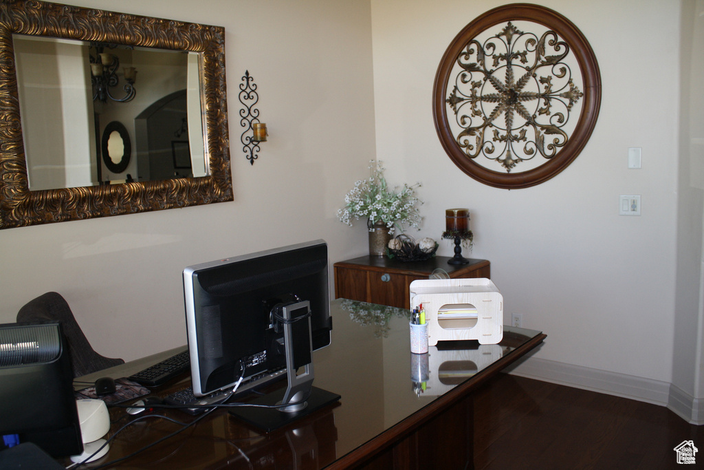 Office featuring hardwood / wood-style floors