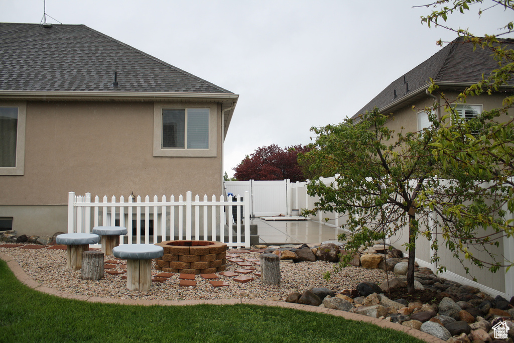 View of yard featuring a fire pit