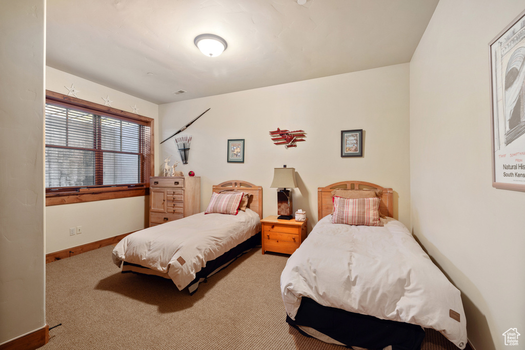 Bedroom featuring carpet floors