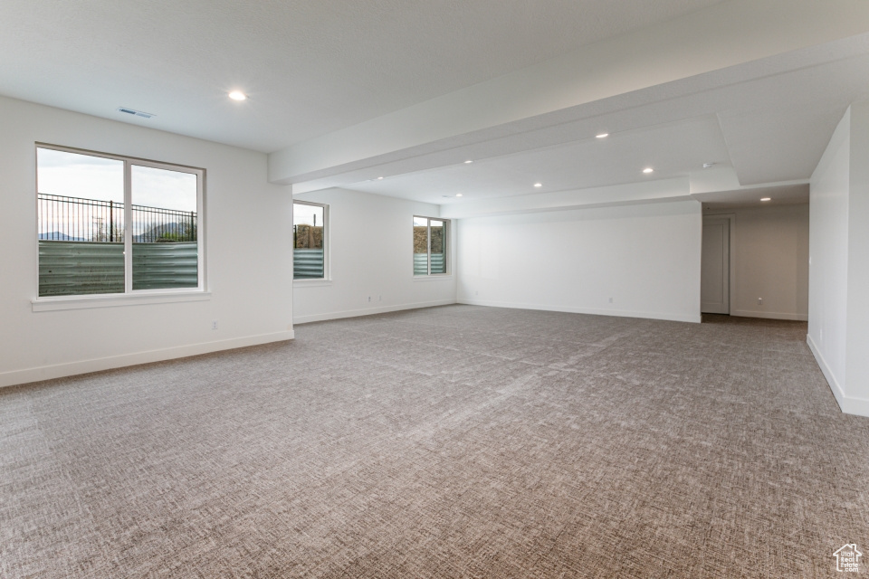 Unfurnished room with baseboards, carpet flooring, and recessed lighting