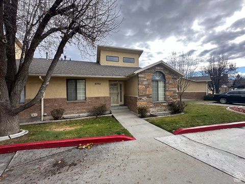 View of front of home with a front lawn
