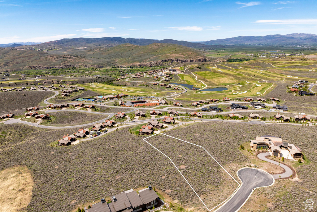 Bird's eye view featuring a water and mountain view