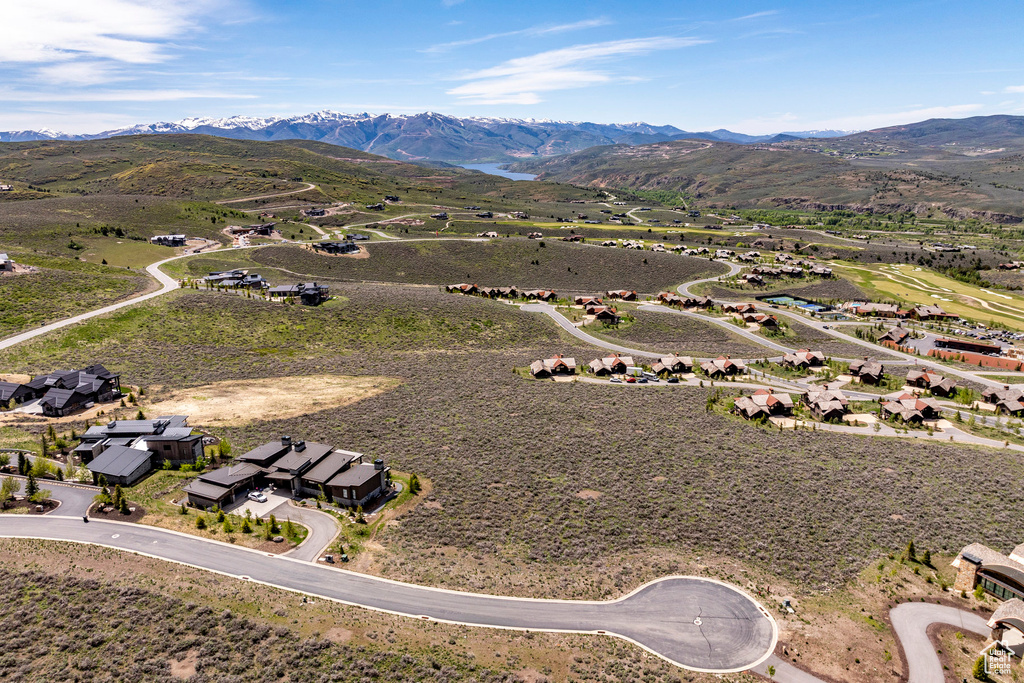 Birds eye view of property featuring a mountain view