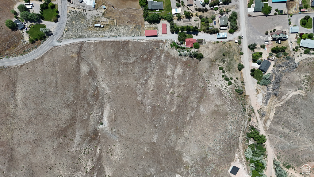 View of property location with nearby suburban area