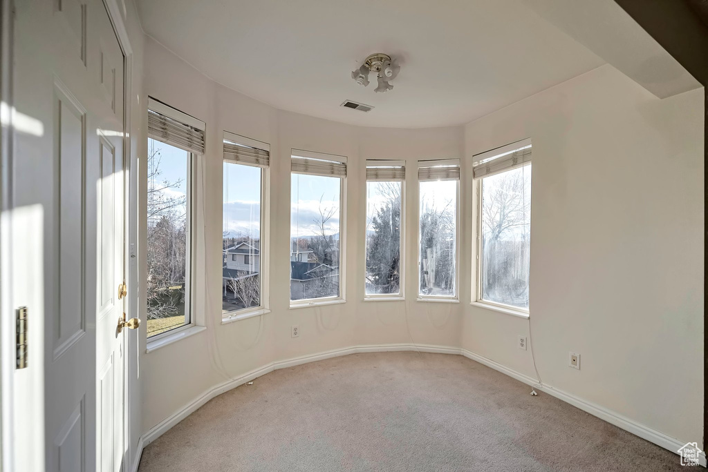 Spare room with light carpet