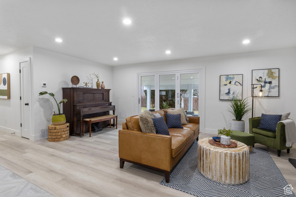 Living room featuring light hardwood / wood-style flooring