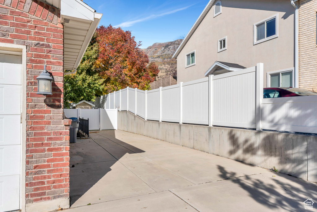 View of patio / terrace with a mountain view